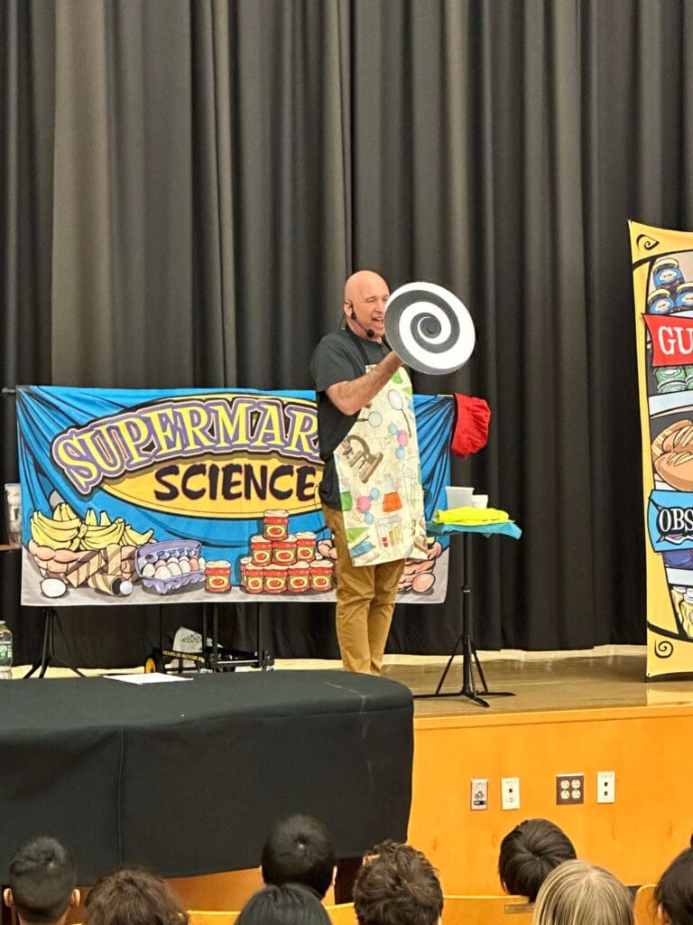 NJ School assembly presenter Michael Kirschner onstage during his STEM school assembly